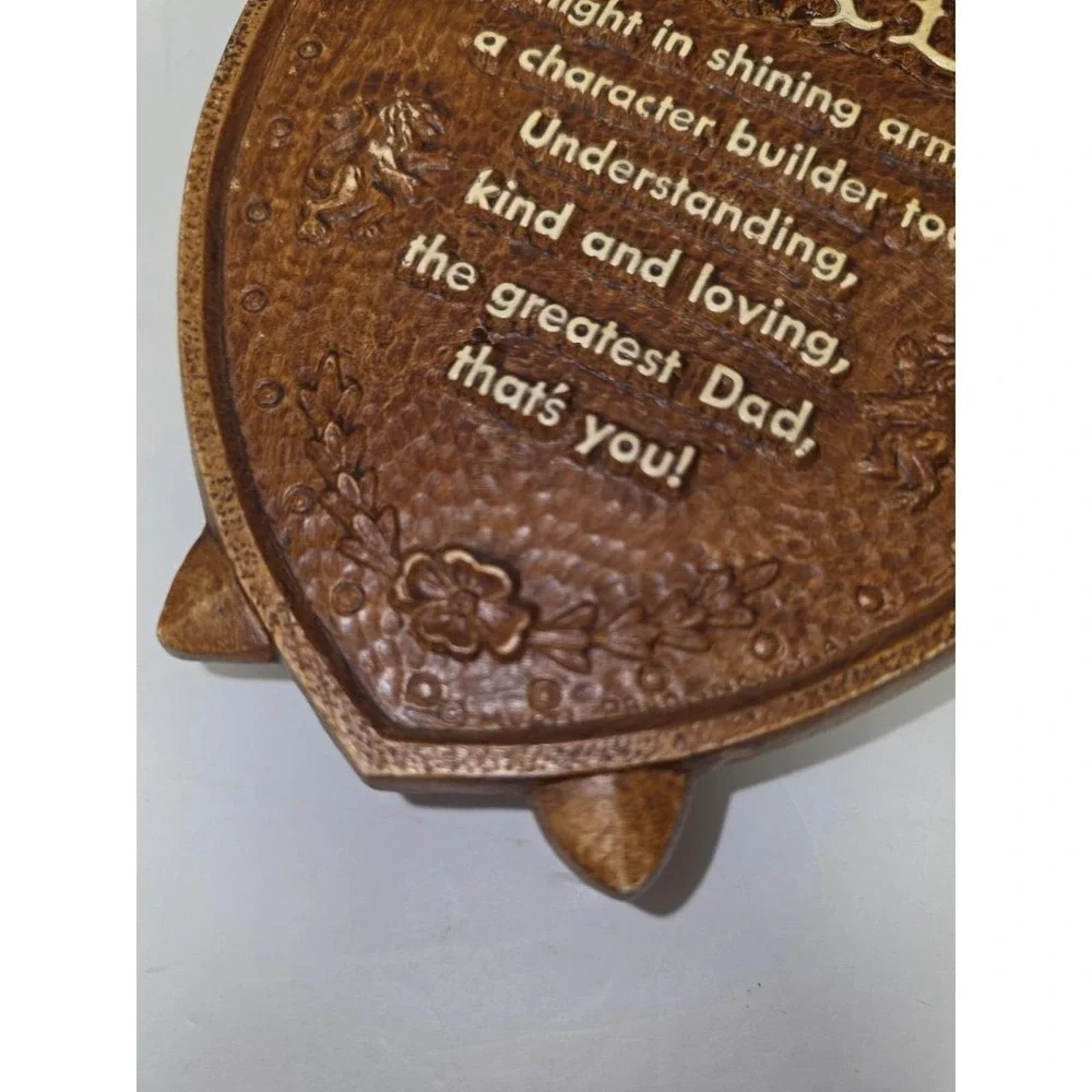 vintage faux wood composite shield-shaped wall plaque featuring a 